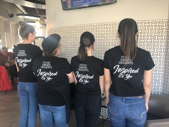 Highlight a witty quote in your cafe uniform